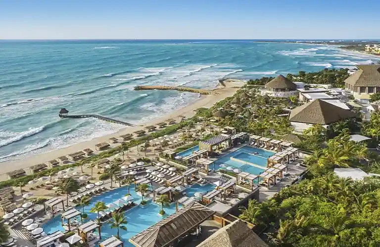 https://www.sqnescapes.com/Riviera Maya Vidanta resort showcasing lush greenery, sparkling pools, and luxurious accommodations
